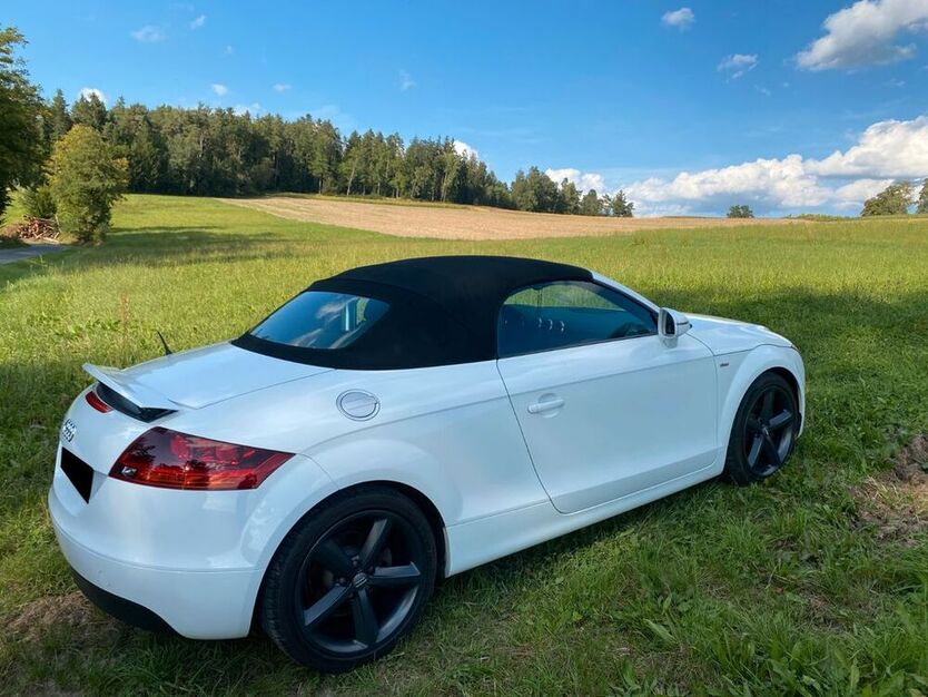 TT