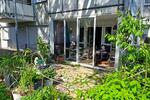 ERDGESCHOSS MIT WINTERGARTEN UND GARTEN