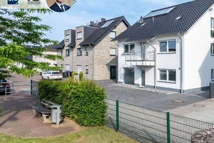 Neuwertiges Mehrfamilienhaus in Hamm-Heessen: 3 Einheiten, Gewerbefläche & privater Garten 9 zimmer