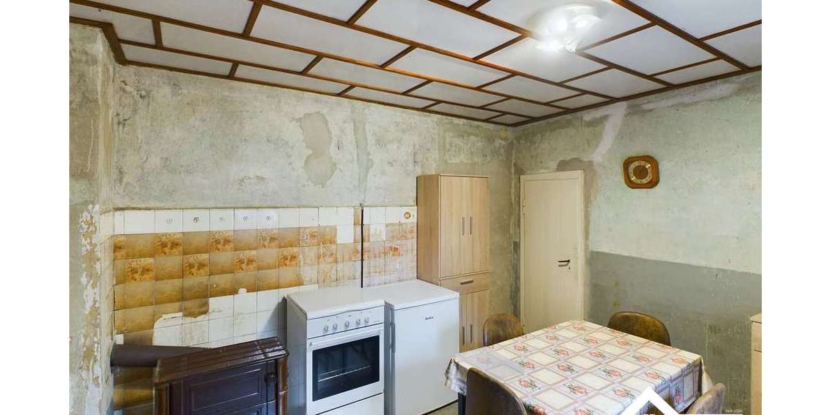 Einfamilienhaus mit viel Potenzial, großem Grundstück und vielseitig nutzbarem Nebengebäude - Einfamilienhaus Grimme Grimme | Angebot:25717453
