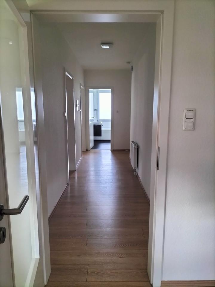 Moderne 3-Zimmer-Wohnung mit hochwertiger Küche und Garten