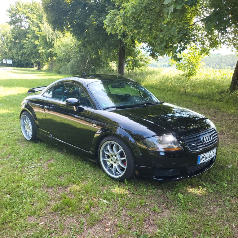 TT