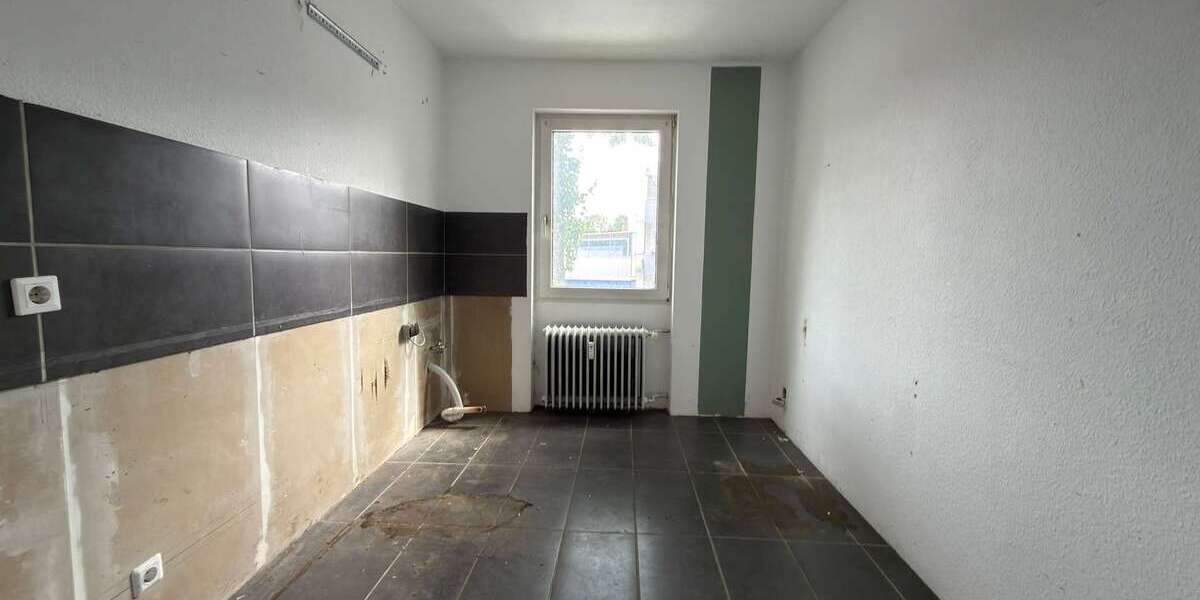 Mehrfamilienhaus mit Potenzial in Dinslaken-Bruch – 5 Wohneinheiten, Garten & Garagen - Mehrfamilienhaus, Wohnhaus Dinslaken Lohberg | Angebot:27119901