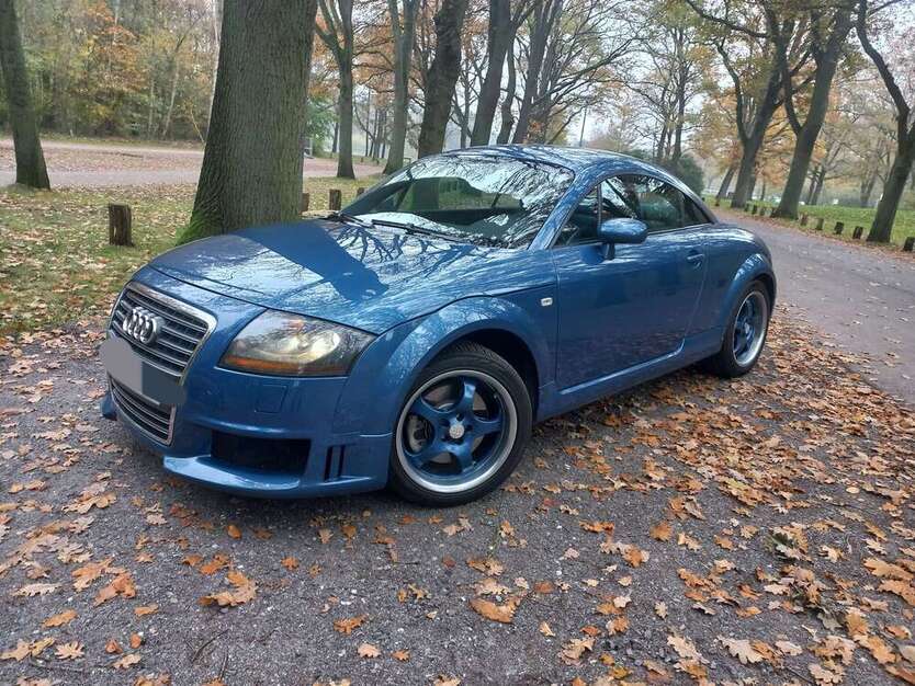TT