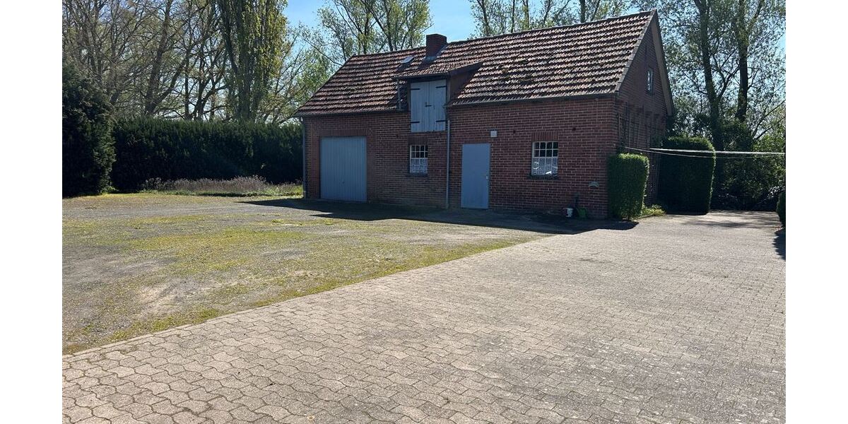 Interessantes Wohnhaus mit 2 Wohnungen, Nebengebäude und Grünland - Einfamilienhaus Stolzenau | Angebot:27142431