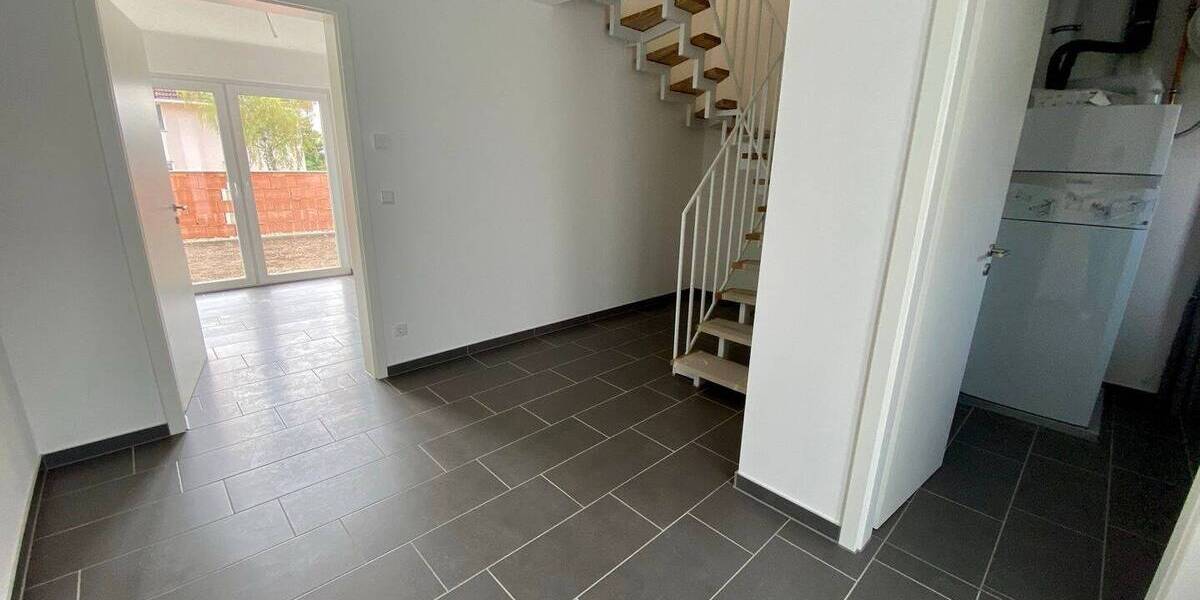 Einziehen und Wohlfühlen! Haushälfte mit Fußbodenheizung, Garage und Garten zu verkaufen! 4 zimmer