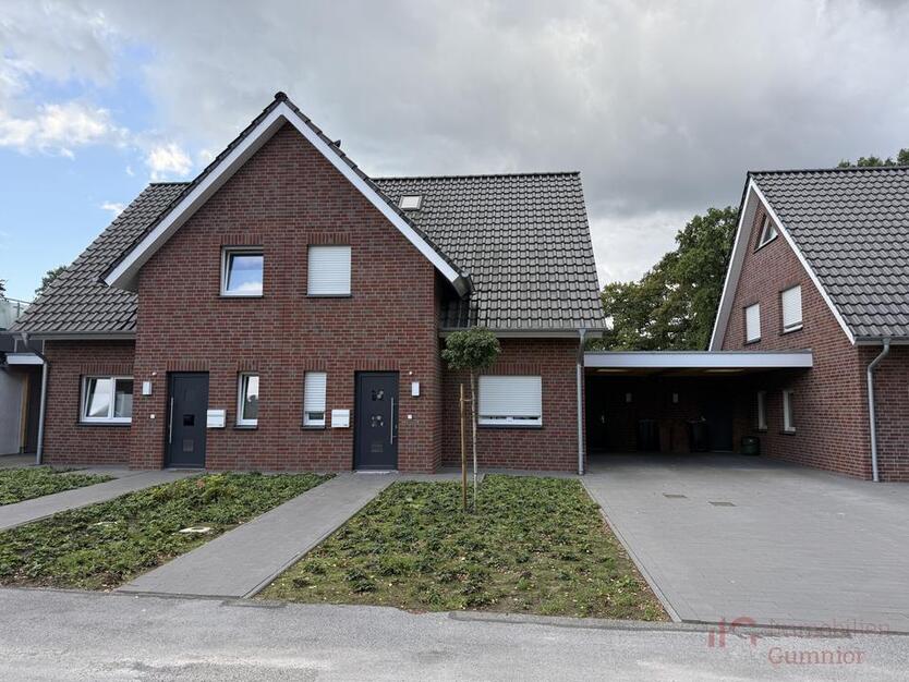 ImmobilieN GUMNIOR präsentiert *provisionsfrei*: Moderne Doppelhaushälfte in Emsbüren mit Garten und Carport