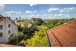 Lichtdurchflutete Dachgeschoßwohnung mit Balkon und Tiefgaragenstellplatz