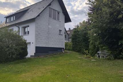 Haus mit 3 Garagen und Garten zimmer
