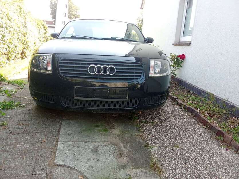 TT