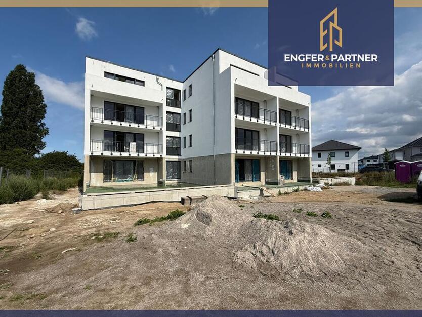 Hochwertige Neubau-Mietwohnung mit 2 Zimmern, Tiefgaragenstellplatz, Fahrstuhl und Balkon! zimmer