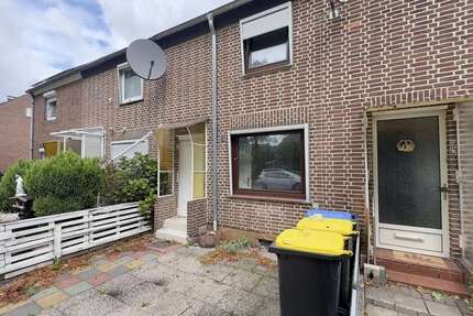 Charmantes Reihenmittelhaus mit Wintergarten, Garage und gepflegtem Garten attraktive Kapitalanlage 4 zimmer