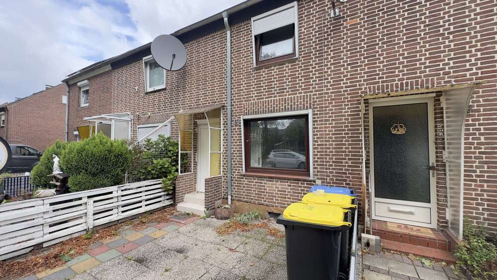 Charmantes Reihenmittelhaus mit Wintergarten, Garage und gepflegtem Garten attraktive Kapitalanlage 4 zimmer