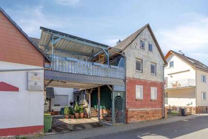 Haus Lollar - 9 Zimmer, 308 m&sup2;, 349.000&euro; | Angebot:26013505