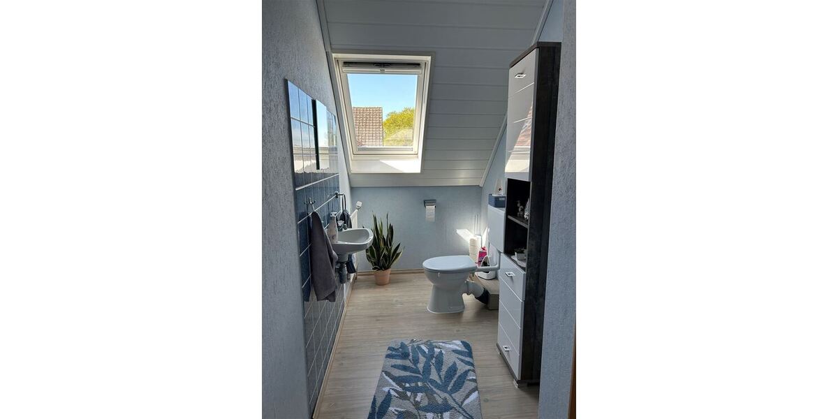 Interessantes Wohnhaus mit 2 Wohnungen, Nebengebäude und Grünland - Einfamilienhaus Stolzenau | Angebot:27142431