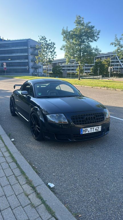 TT