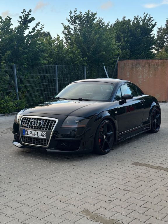 TT