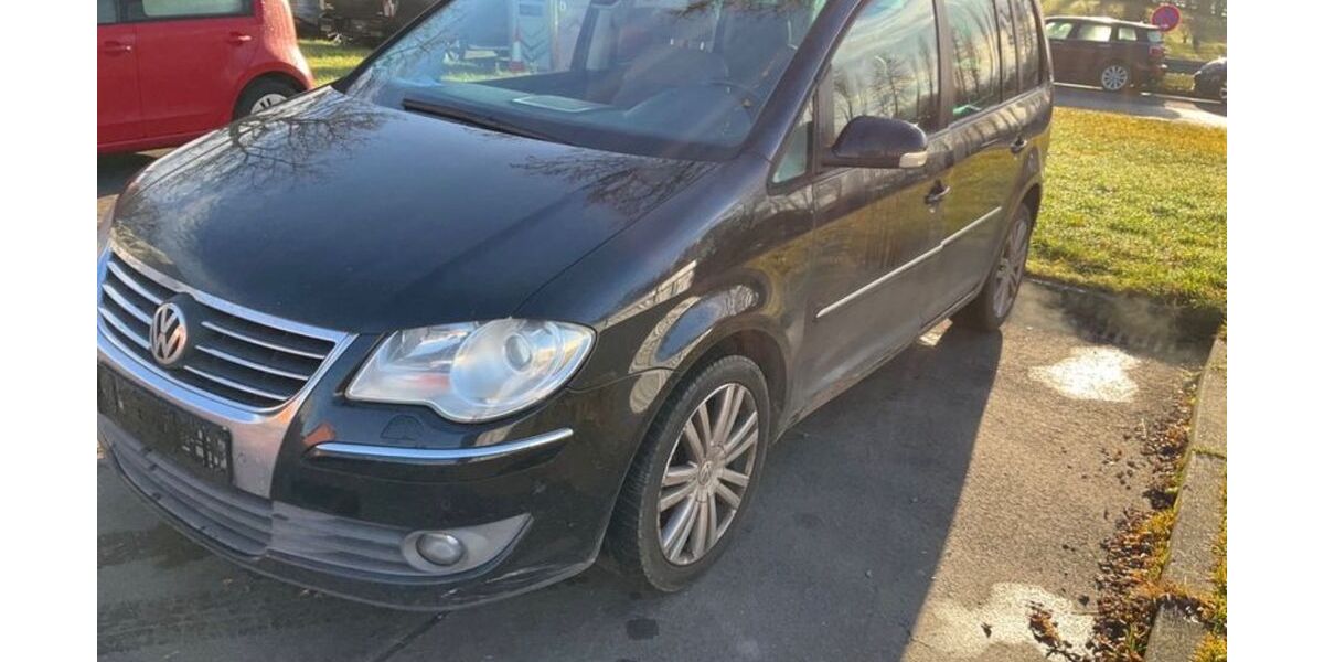 VW Touran 217.799 km 3.000 &euro; München 80999