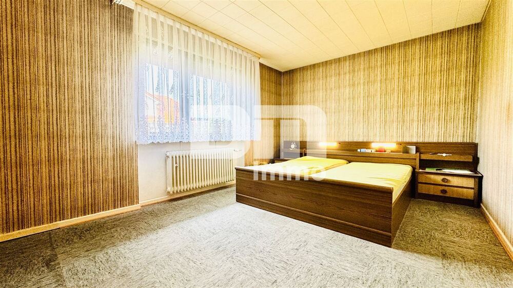Solide Doppelhaushälfte mit viel Potenzial, Wintergarten und schönem Garten in beliebter Lage - Doppelhaushälfte Fuldabrück | Angebot:27302786