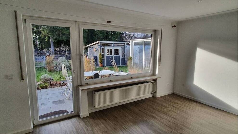 WEIGERT: Ansprechende Doppelhaushälfte mit ausgebautem Dachgeschoss und liebevoll angelegtem Garten