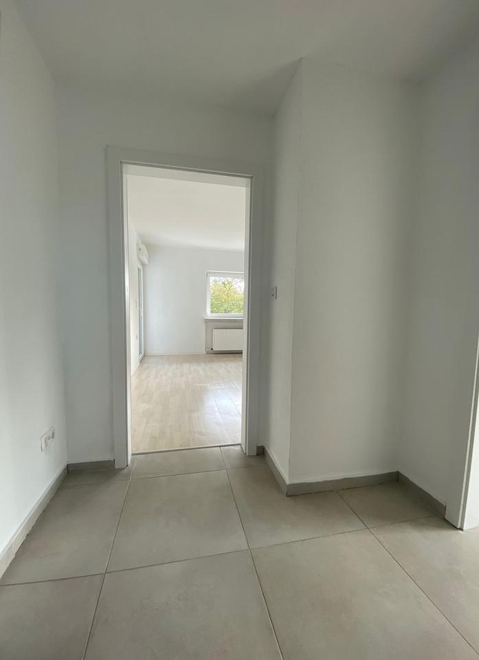 Moderne 3-Zimmer-Wohnung mit Dachterrasse und Tiefgarage in Arpke zimmer