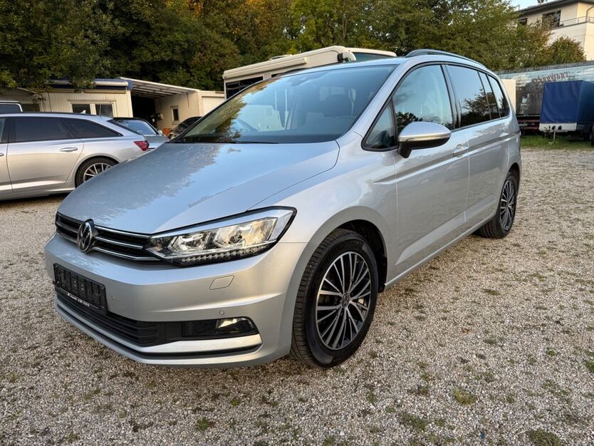 VW Touran 111.000 km 21.000 € München 80995