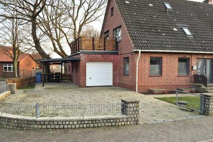 Renovierte Doppelhaushälfte mit Garten, Dachterrasse und Kamin 4 zimmer