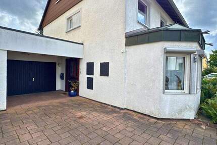 Einfamilienhaus mit Wintergarten, Garage + parkähnlichem Garten 6 zimmer