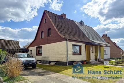 Flintbek - DHH mit Carport, Garage und viel Potential!