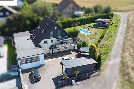 Ihr Rückzugsort am Feldrand-Mehrfamilienhaus mit Garten, Pool und Sauna in Lohra-Kirchvers 1 zimmer