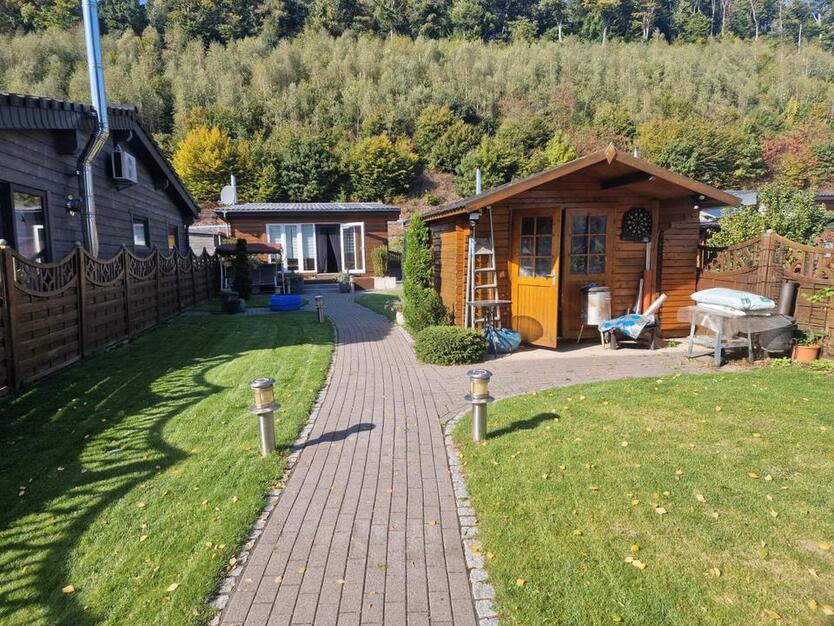 Charmantes Ferienhaus am See mit Steg, Sauna & Smart-Garten zimmer