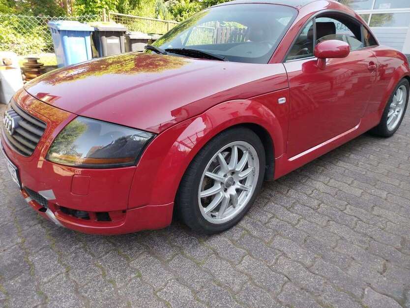 TT