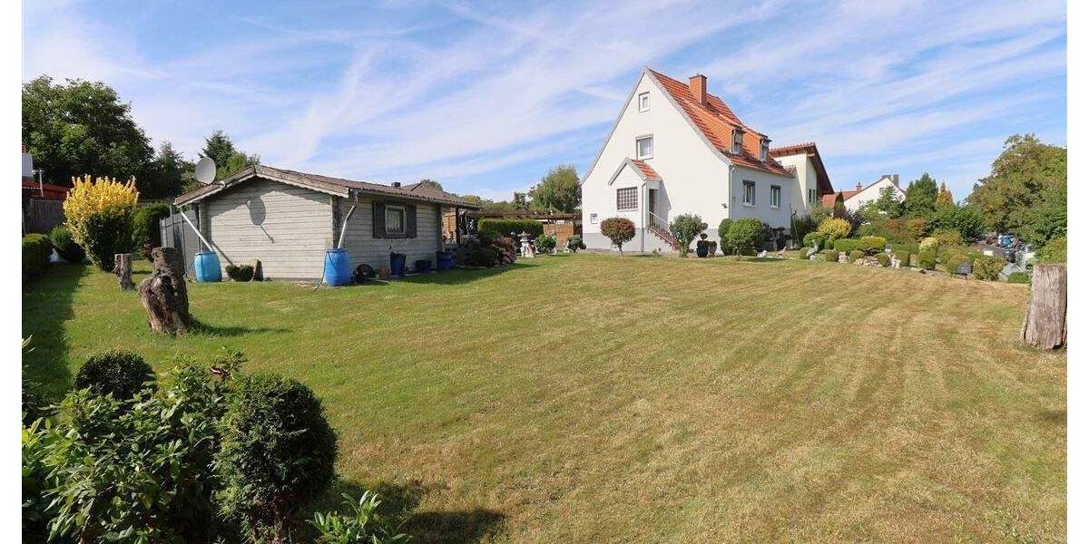 Wohlfühlen pur: Einfamilienhaus mit Traumgarten und zwei Carports 5 zimmer