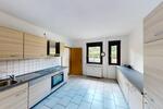 Moderne 2 Zimmer Wohnung mit Traumgarten & Garage in ruhiger Lage