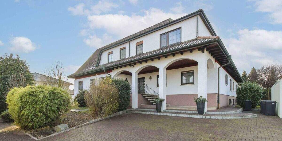 Gehoben und gepflegt: MFH mit 3 Wohneinheiten und Garten in familienfreundlicher Lage von Dornheim 1 zimmer