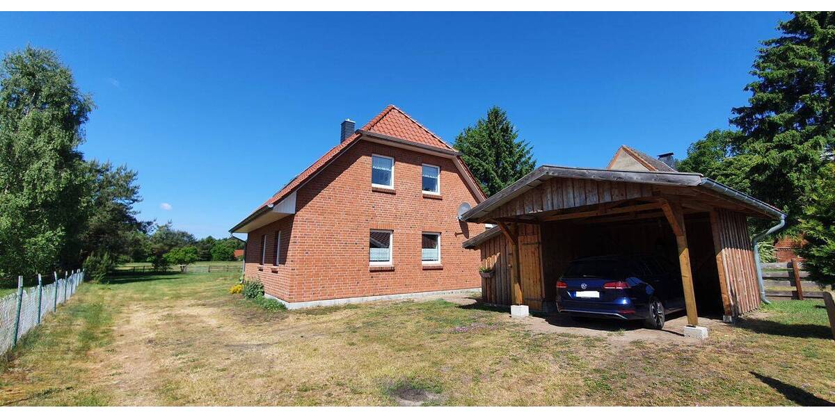 Neuwertiges EFH mit Wärmepumpe, Carport, 2 Bäder, EBK und eigenes Grünland - Einfamilienhaus Dömitz Heidhof | Angebot:26057443