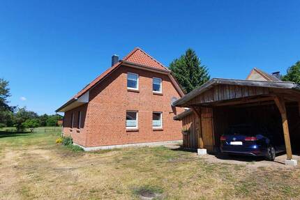 Neuwertiges EFH mit Wärmepumpe, Carport, 2 Bäder, EBK und eigenes Grünland - Haus Dömitz Heidhof | Angebot:26057443