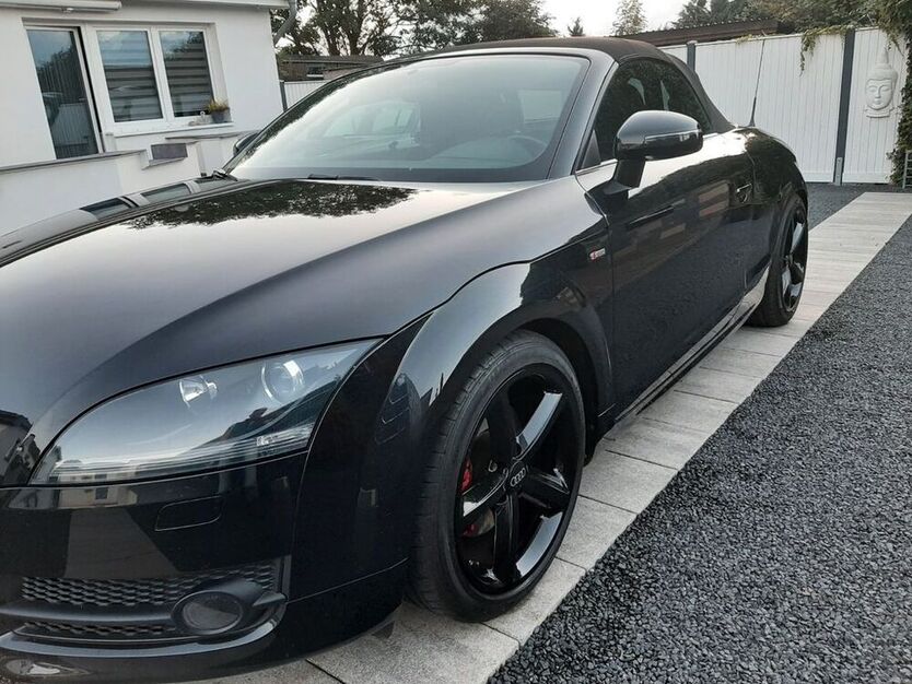 TT