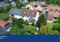 Attraktive Doppelhaushälfte in Rottenbauer - 3 vermietete Einheiten auf großzügigem Grundstück