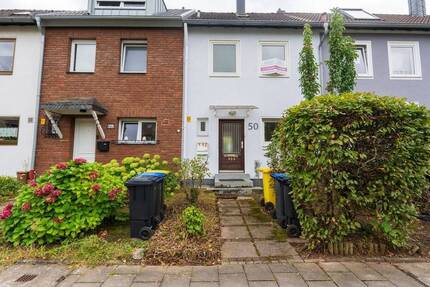 Harmonisches Wohnen: Gepflegtes Reihenmittelhaus mit komfortablen Garten in ruhiger Lage