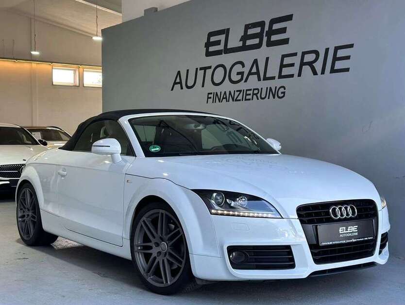 TT