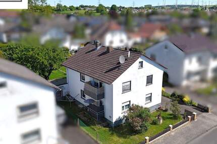 Grünes Wohnglück - Modernisiertes Zweifamilienhaus mit gepflegtem Garten 8 zimmer