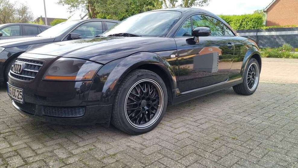 TT