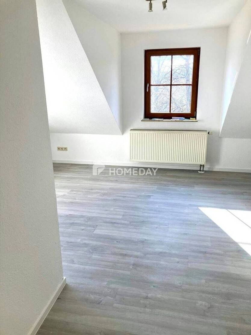 Attraktive Dachgeschosswohnung mit 2 Zimmern, Balkon und Gartennutzung in Eischleben 2 zimmer