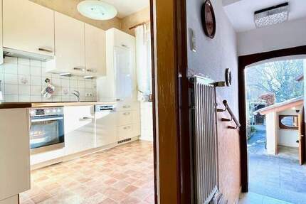 Geräumiges Stadthaus mit sonnigem Garten und kluger Aufteilung - zentrale Lage 6 zimmer