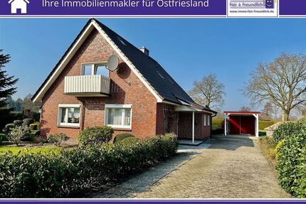 Einfamilienhaus mit Balkon, Kaminofen und Wintergarten in Wiesederfehn