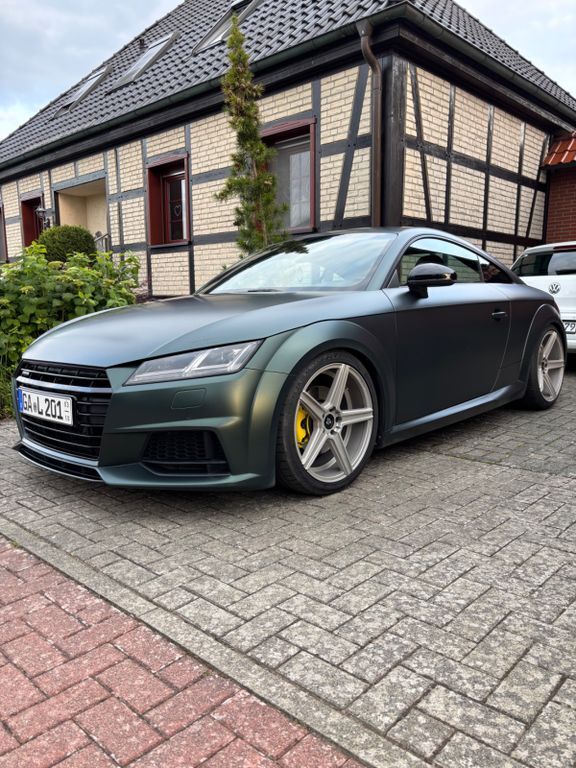 TT