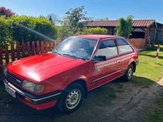 Mazda 323 98.500 km 3.299 &euro; Babenhausen 64832