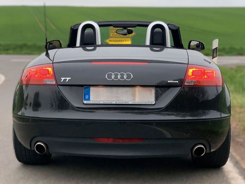TT