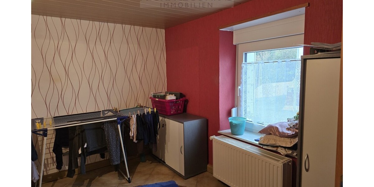 Modernisiertes Einfamilienhaus mit Einliegerwohnung Schmelz zentral - Einfamilienhaus Schmelz | Angebot:27010373